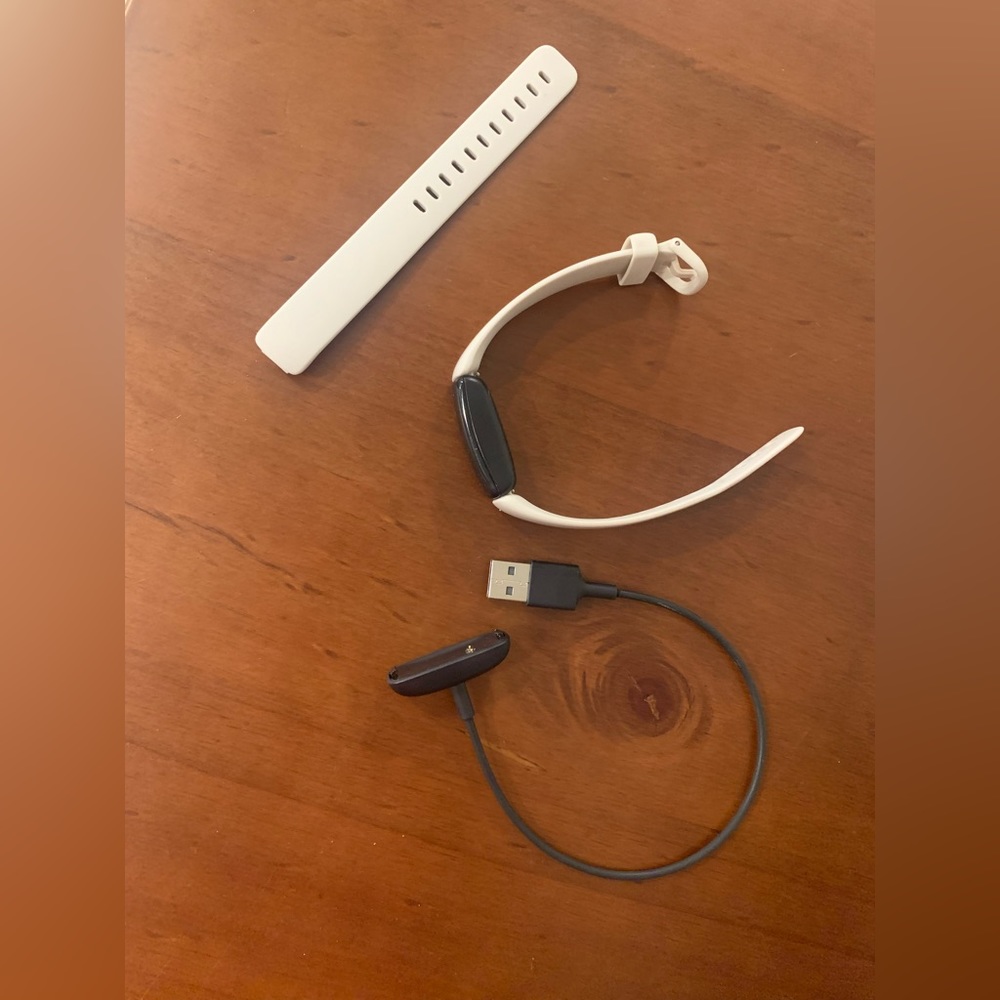 Gently used Fitbit Inspire 2 (with beige and black wrist bands)